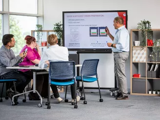 Small group of colleagues at training session